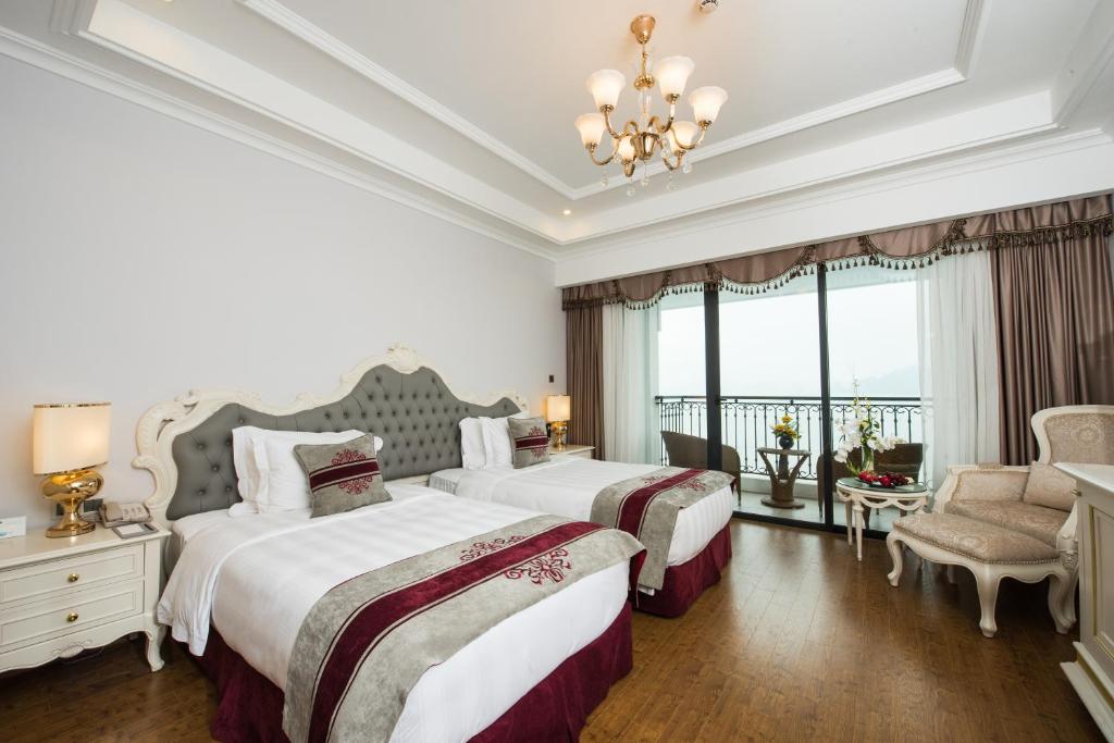 Двухместный (Двухместный номер Делюкс с 2 отдельными кроватями) курортного отеля Vinpearl Ha Long Bay Resort, Халонг