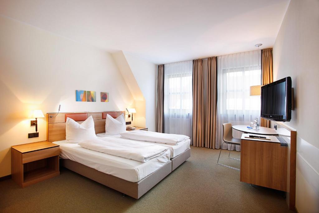 Двухместный (Улучшенный двухместный номер с 1 кроватью) отеля Hotel Am Jakobsmarkt, Нюрнберг