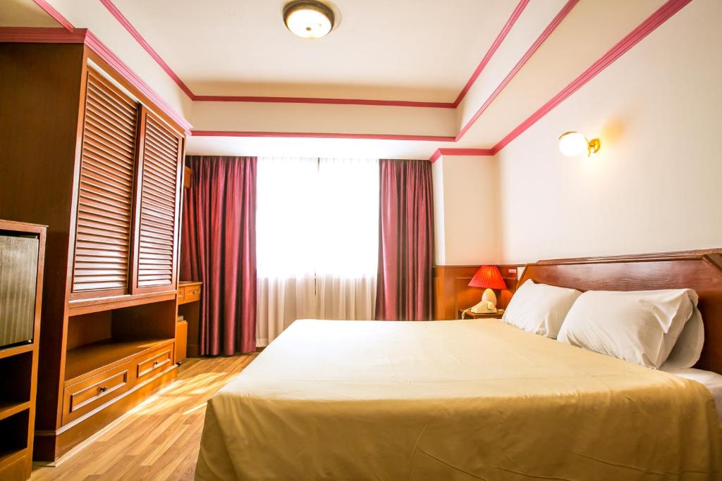 Двухместный (Улучшенный двухместный номер с 1 кроватью) отеля Elizabeth, Бангкок