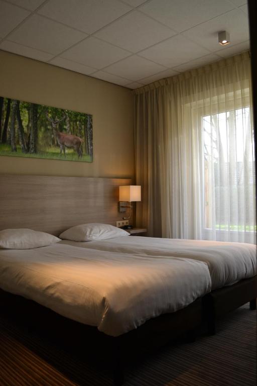 Двухместный (Двухместный номер «Комфорт» с 1 кроватью и террасой) отеля Fletcher Hotel Het Veluwse Bos, Арнем