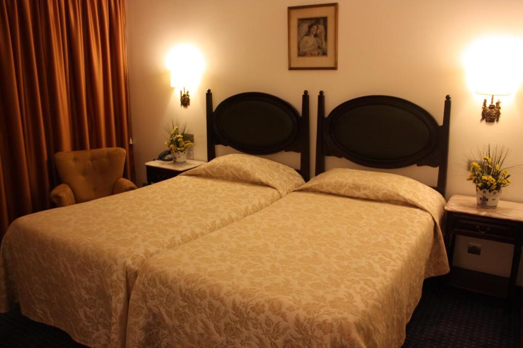 Двухместный (Двухместный номер эконом-класса с 1 кроватью или 2 отдельными кроватями) отеля Hotel Vice-Rei, Порту