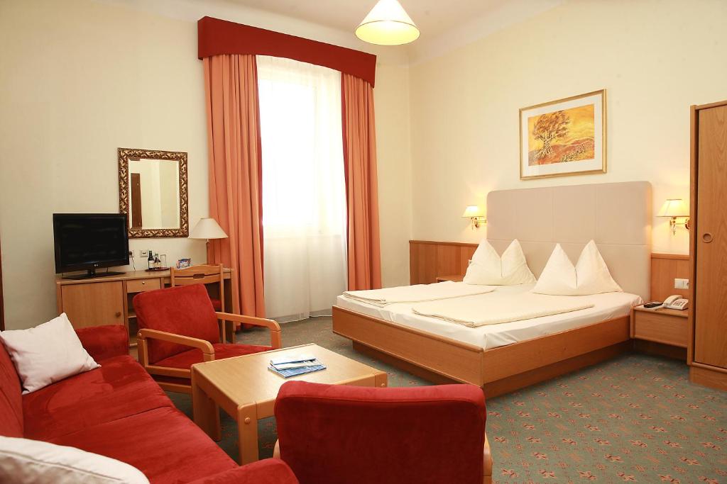 Двухместный (Улучшенный двухместный номер с 1 кроватью) отеля Altstadthotel Mosser, Филлах