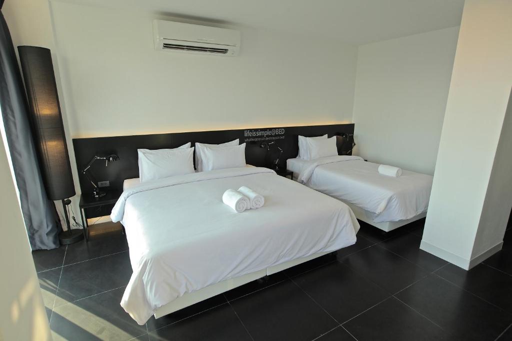 Семейный (Трехместный номер с 1 двуспальной кроватью и 1 односпальной кроватью) отеля BED Nimman, Чиангмай