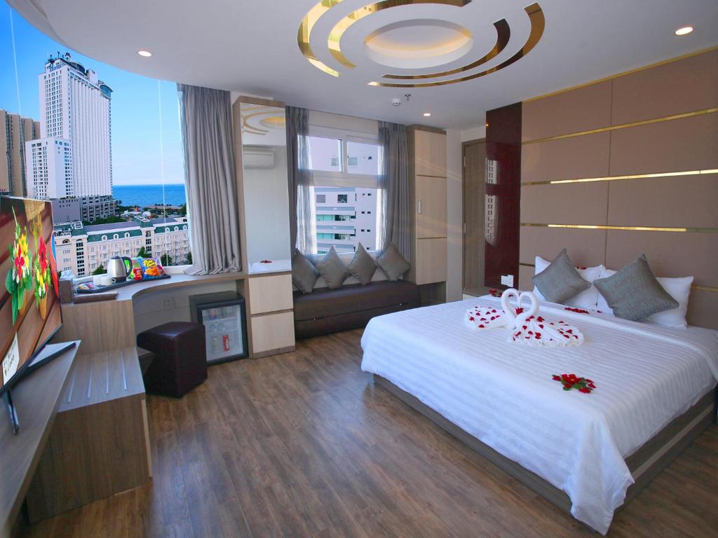 Двухместный (Двухместный номер Делюкс с 1 кроватью или 2 отдельными кроватями) отеля New Sun Hotel, Нячанг