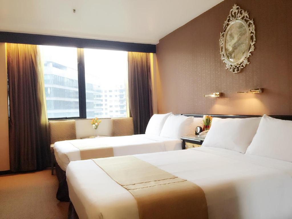 Семейный (Двухместный номер Делюкс с 2 двуспальными кроватями и видом на залив) отеля Best Western Plus Hotel Kowloon, Гонконг (город)