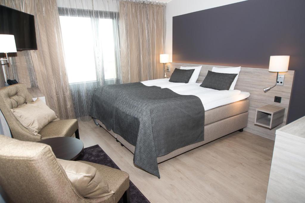 Двухместный (Улучшенный двухместный номер с 1 кроватью или 2 отдельными кроватями) отеля Hotel Pommern, Мариехамн