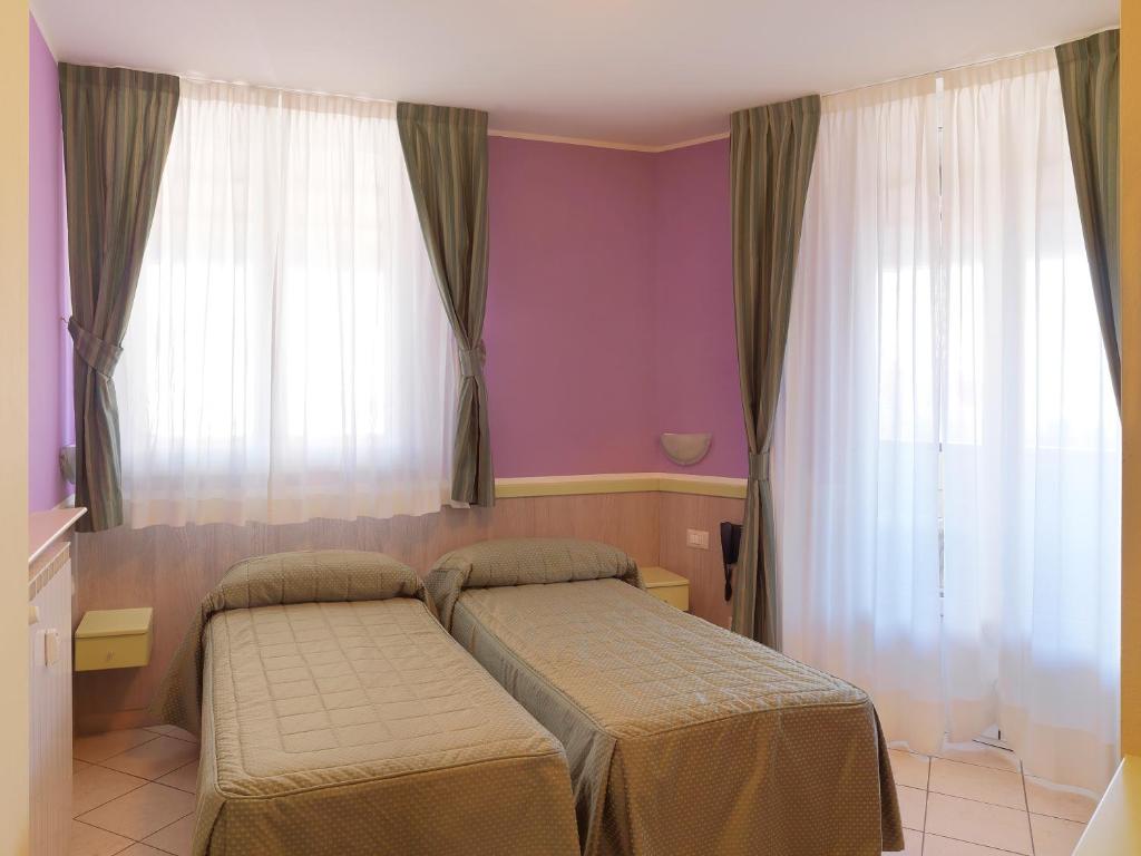 Двухместный (Двухместный номер с 2 отдельными кроватями) отеля Hotel Arco Romana, Милан