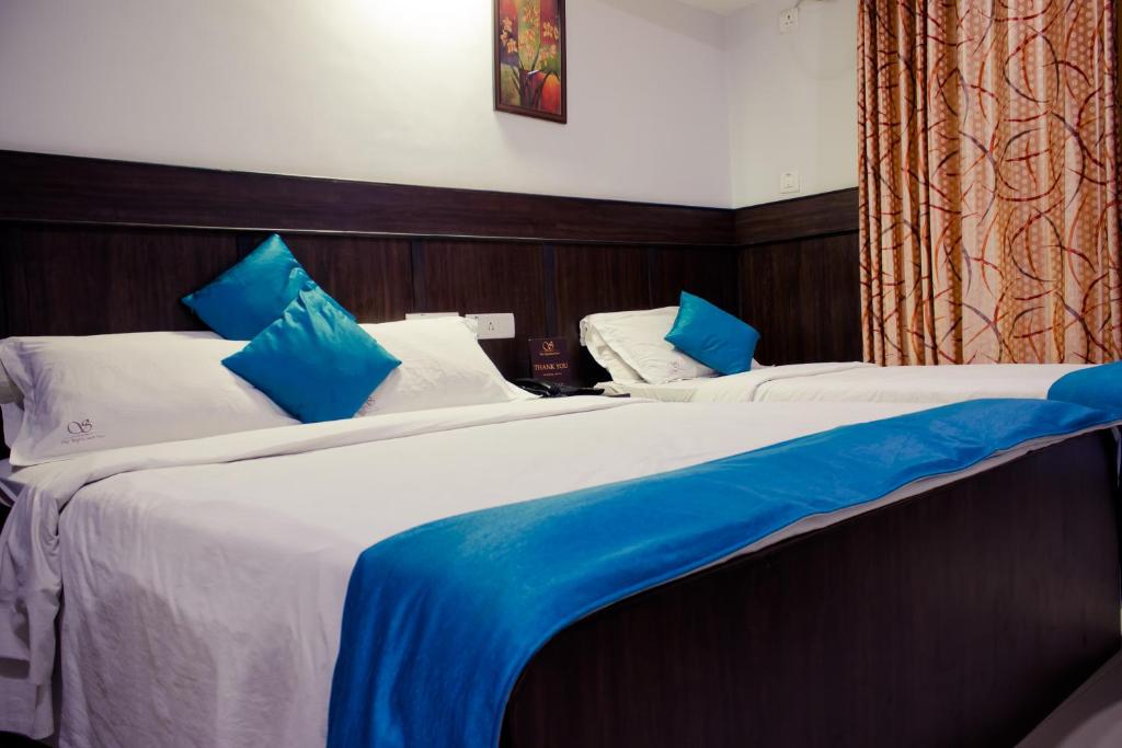 Четырехместный (Четырехместный номер с вентилятором) отеля The Signature Inn, Бангалор