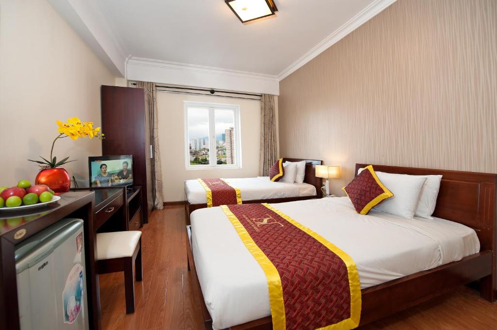 Двухместный (Двухместный номер Делюкс с 2 отдельными кроватями) отеля Beautiful Beach Hotel, Дананг