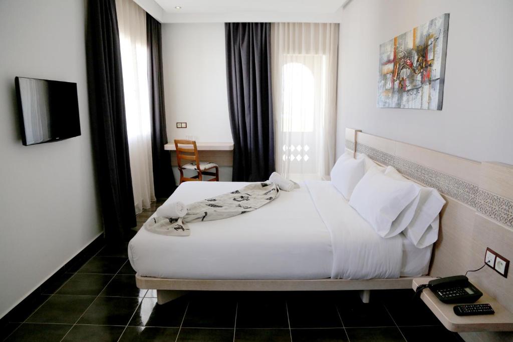 Двухместный (Улучшенный двухместный номер с 1 кроватью) отеля Hotel A44, Тетуан