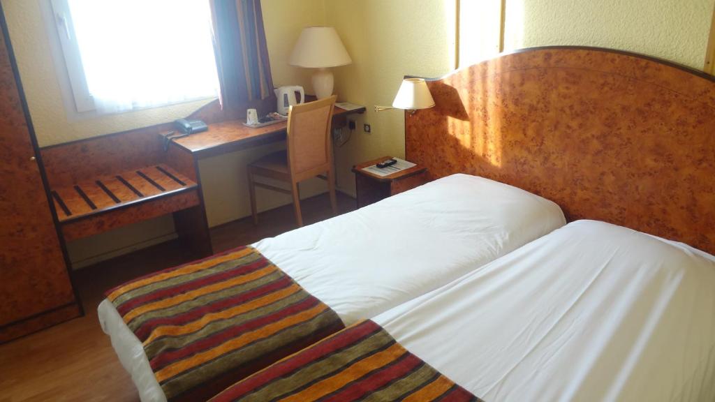 Двухместный (Двухместный номер с 2 отдельными кроватями) отеля Cottage Hôtel, Кале (О-де-Франс)