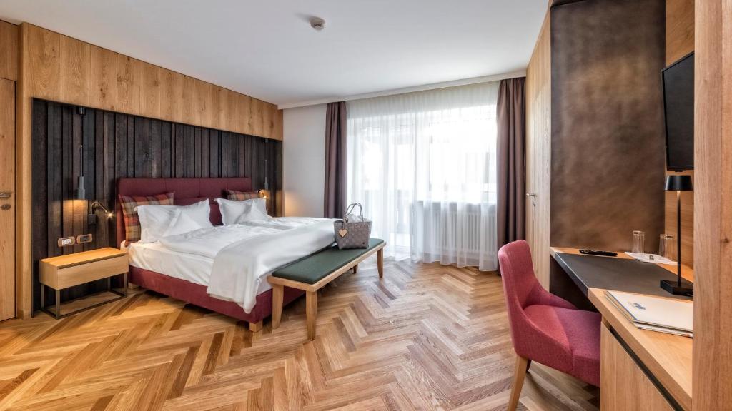 Двухместный (Классический двухместный номер с 1 кроватью или 2 отдельными кроватями) отеля Hotel Genziana, Ортизеи
