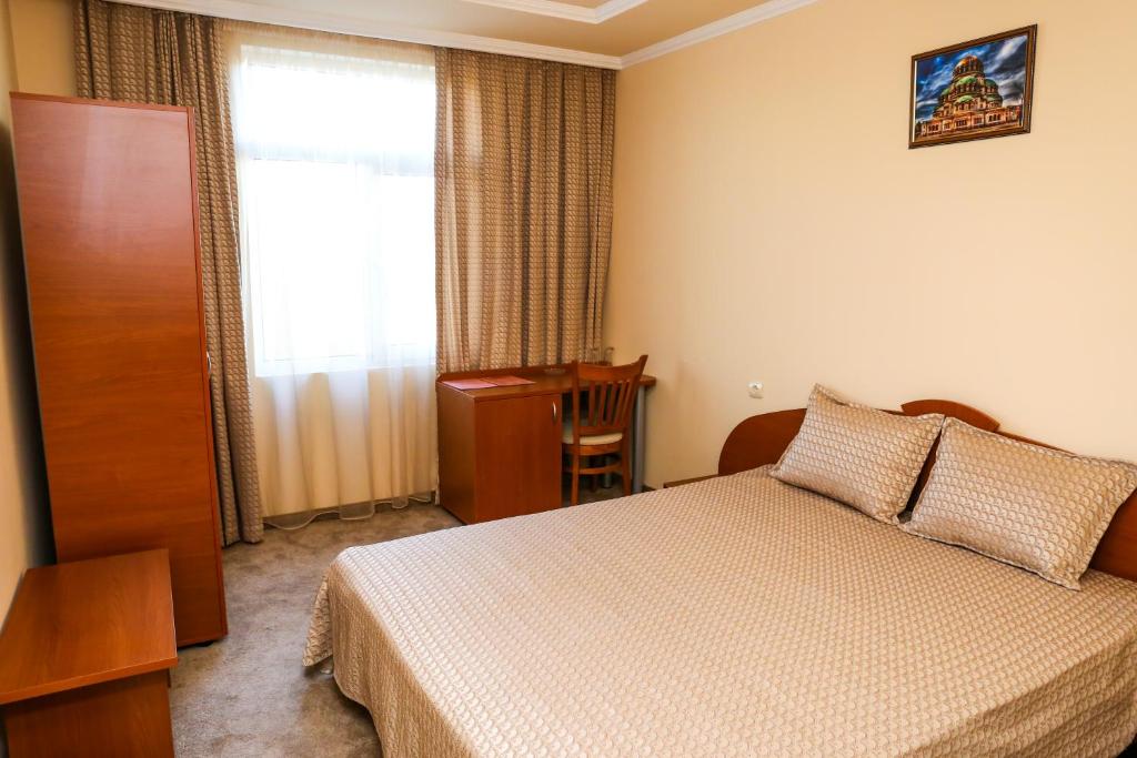 Двухместный (Двухместный номер с 1 кроватью или 2 отдельными кроватями) отеля Hotel Bulgaria, Кырджали