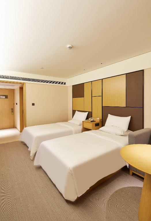 Двухместный (Для граждан материкового Китая - Двухместный номер c 2 отдельными кроватями и нулевым давлением) отеля JI Hotel Ningbo South Business District, Нинбо