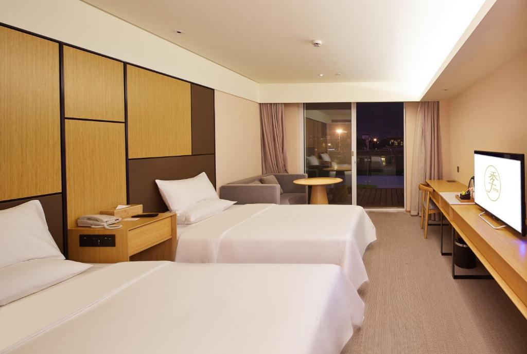 Двухместный (Для граждан материкового Китая ‒ Двухместный номер с 2 отдельными кроватями) отеля JI Hotel Ningbo South Business District, Нинбо
