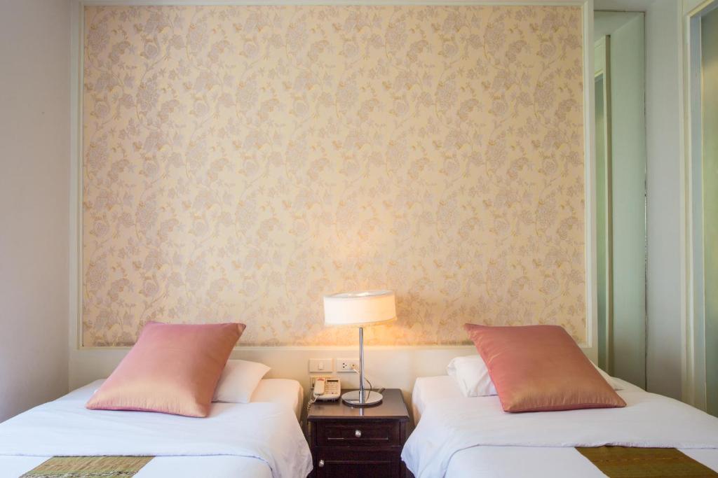 Двухместный (Двухместный номер Делюкс с 1 кроватью или 2 отдельными кроватями) отеля Aphrodite Inn Bangkok, Бангкок