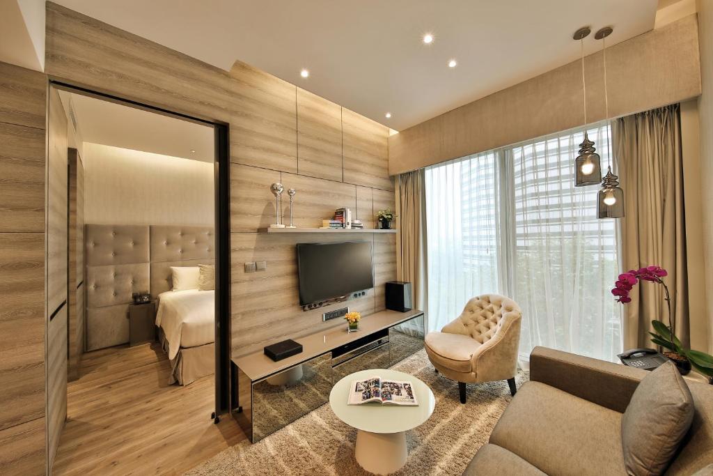 Апартаменты (Апартаменты Делюкс с 1 спальней) апарт-отеля Pan Pacific Serviced Suites Beach Road, Сингапур (город)