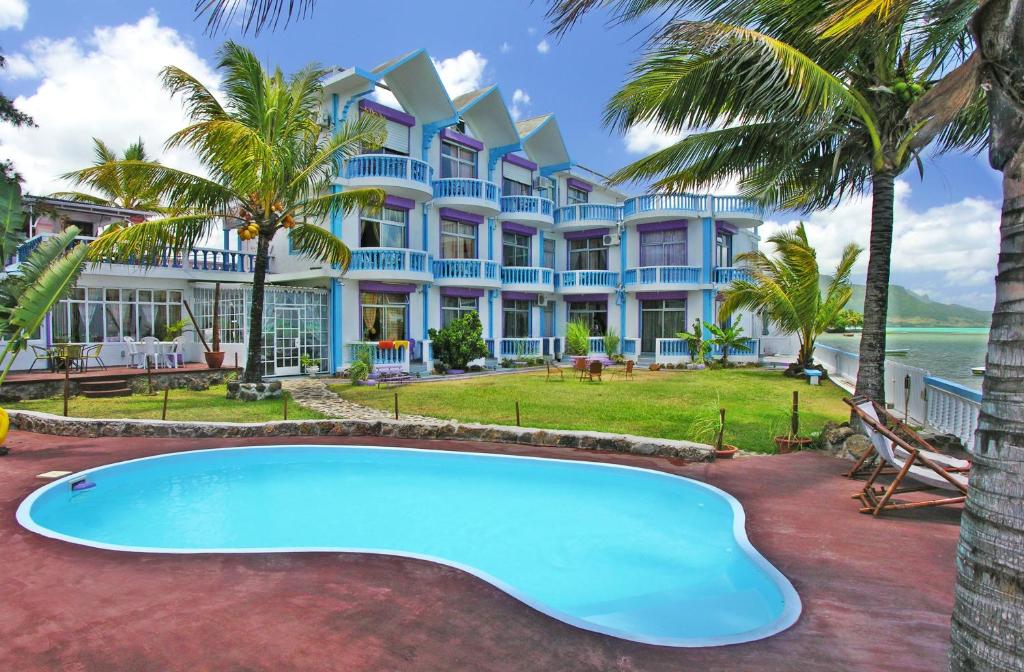 Двухместный (Двухместный номер Делюкс с 1 кроватью и боковым видом на море) отеля Coco Villa Маэбург