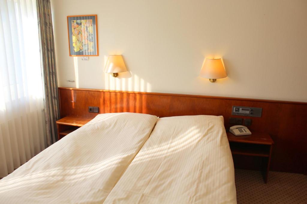Двухместный (Двухместный номер с 1 кроватью или 2 отдельными кроватями) отеля Hotel Elbroich, Дюссельдорф