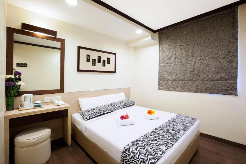 Двухместный (Улучшенный двухместный номер с 1 кроватью) отеля Hotel 81 Fuji, Сингапур (город)