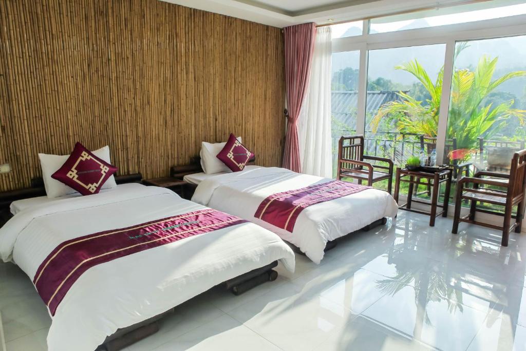 Двухместный (Двухместный номер Делюкс с 2 отдельными кроватями, вид на горы и долину) отеля Mai Chau Sunset Boutique Hotel, Май Чау