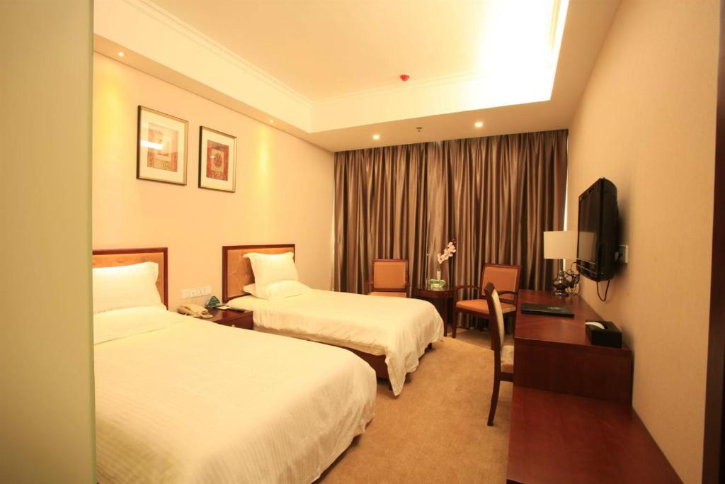 Двухместный (Для граждан материковой части Китая — Стандартный двухместный номер с 2 отдельными кроватями) отеля GreenTree Inn Hebei Qinhuangdao Peace Avenue Express Hotel, Циньхуандао