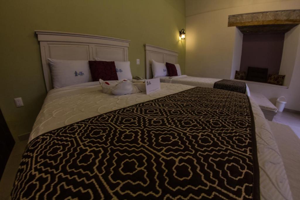 Двухместный (Двухместный номер Делюкс с 2 двуспальными кроватями) отеля Casa Jose Maria, Морелия