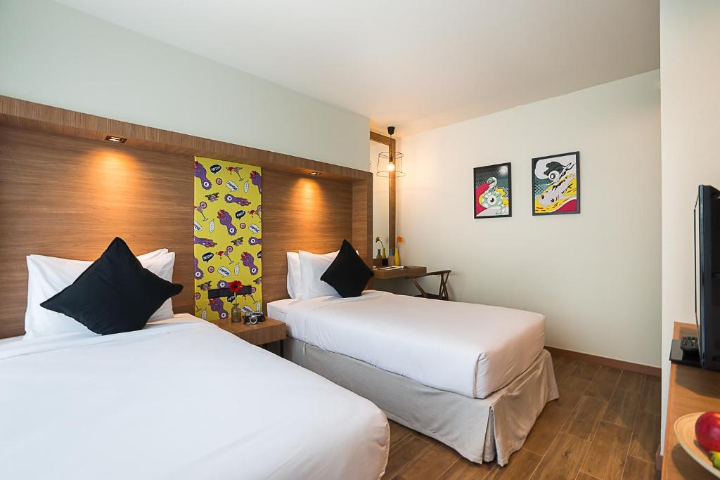 Двухместный (Улучшенный двухместный номер с 1 кроватью или 2 отдельными кроватями) отеля Sunshine Hip, Паттайя