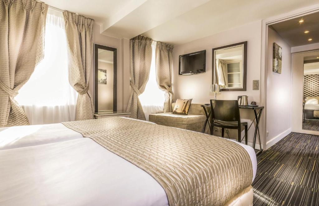 Двухместный (Двухместный номер с 2 отдельными кроватями) отеля Hotel Ile de France Opéra, Париж