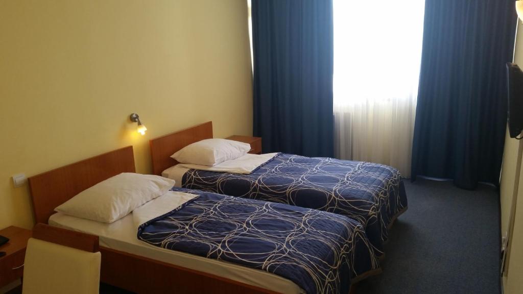 Двухместный (Двухместный номер эконом-класса с 1 кроватью или 2 отдельными кроватями, балконом и видом на город) отеля Hotel Zagreb, Сплит