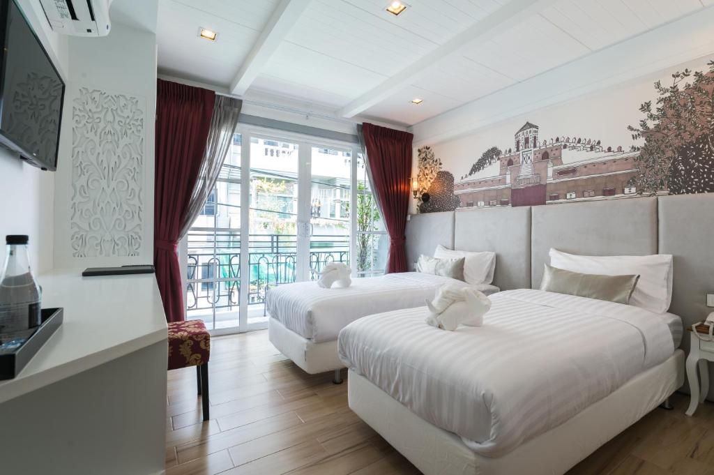 Двухместный (Двухместный номер Делюкс с 2 отдельными кроватями и балконом) отеля White Ivory Bed And Breakfast, Бангкок