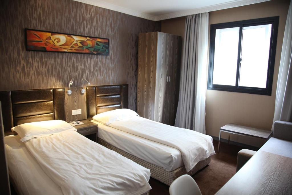 Двухместный (Стандартный двухместный номер с 2 отдельными кроватями) отеля Shanghai Fish Inn Bund, Шанхай