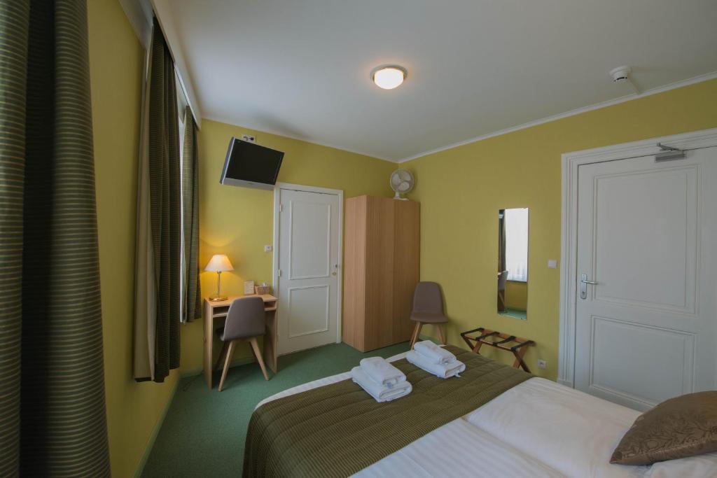 Двухместный (Двухместный номер с 2 отдельными кроватями) отеля Hotel Groeninghe, Брюгге