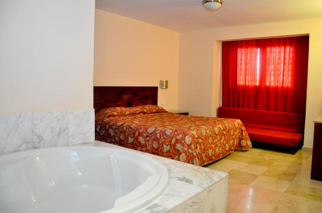 Двухместный (Номер Делюкс с кроватью размера «king-size») отеля Hotel 2 Bavaro, Пунта-Кана
