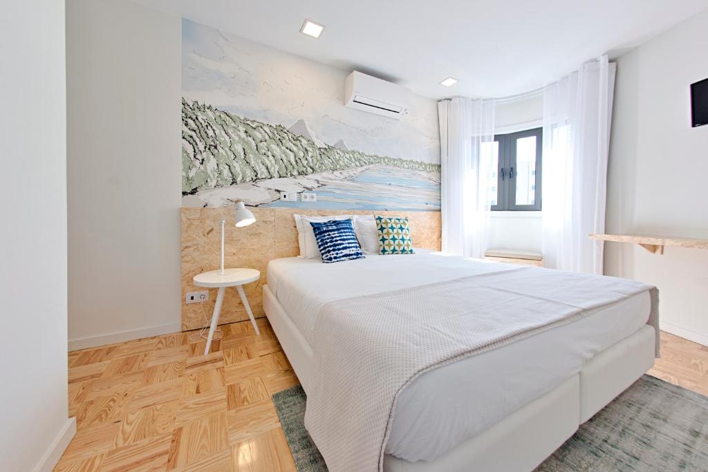 Двухместный (Двухместный номер Делюкс с 1 кроватью или 2 отдельными кроватями) гостевого дома Cale do Oiro - Suites Residence, Авейру