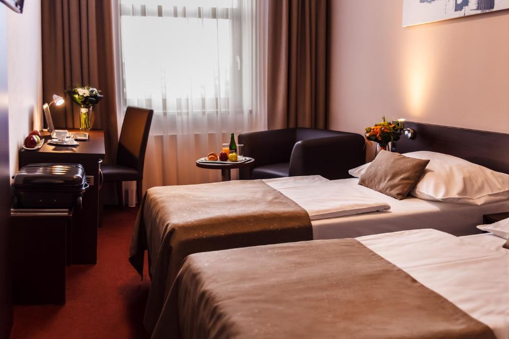 Двухместный (Двухместный номер с 2 отдельными кроватями) отеля Interhotel Moskva, Злин