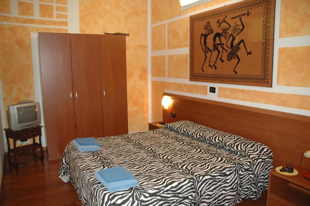 Двухместный (Двухместный номер с 1 кроватью или 2 отдельными кроватями) отеля Albergo Astro, Генуя