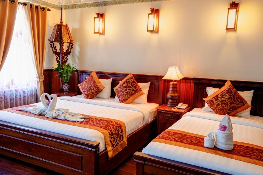 Двухместный (Двухместный номер «Премьер» с 2 отдельными кроватями) отеля Okay Boutique Hotel, Пномпень