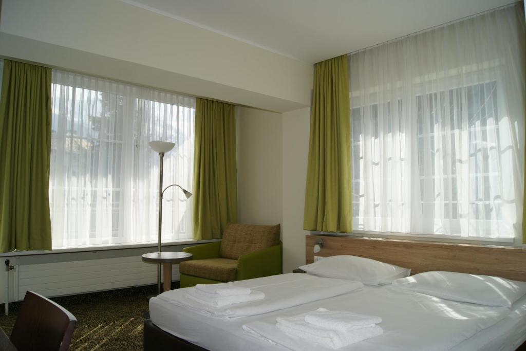 Двухместный (Двухместный номер «Премиум» с 1 кроватью или 2 отдельными кроватями и балконом) отеля Hotel Lindenhof, Бад-Гастайн