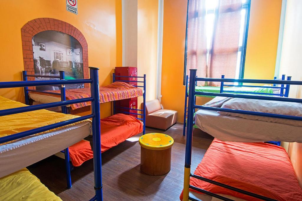 Номер (Односпальная кровать в общем номере для мужчин и женщин (8 взрослых)) хостела Hostel Amigo, Мехико