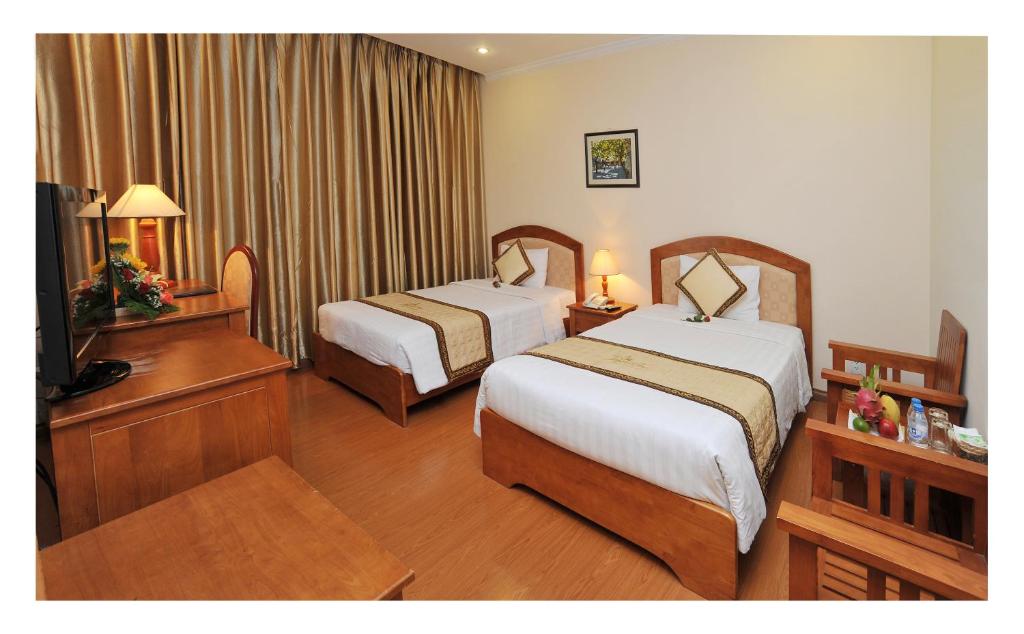 Двухместный (Улучшенный двухместный номер с 1 кроватью или 2 отдельными кроватями) отеля Bamboo Green Hotel, Дананг