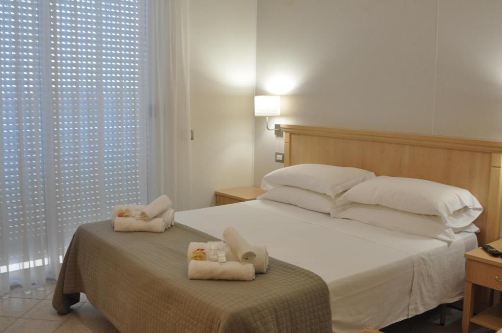 Двухместный (Двухместный номер с 1 кроватью или 2 отдельными кроватями и возможностью посещения спа-салона) отеля Hotel Adriatic&Beauty, Римини