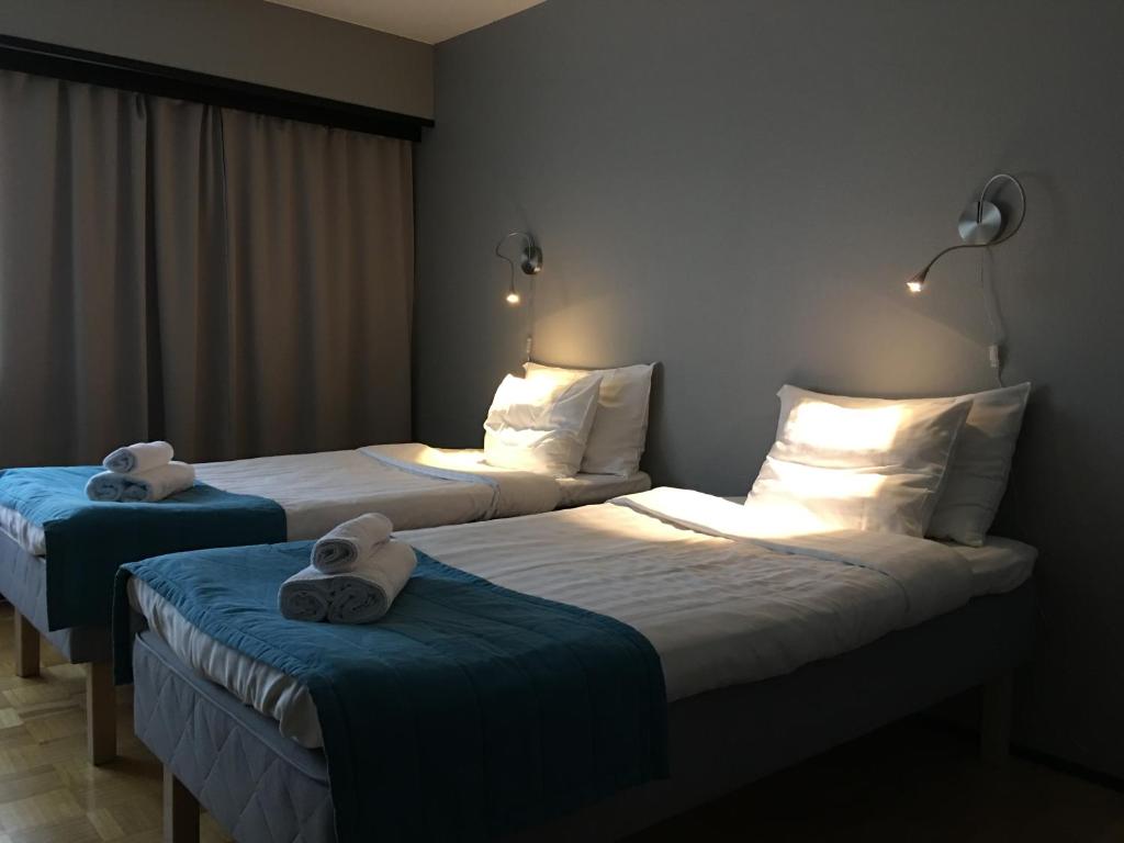 Двухместный (Двухместный номер Делюкс с 1 кроватью или 2 отдельными кроватями и сауной) отеля Hotel Nukkumatti, Коккола