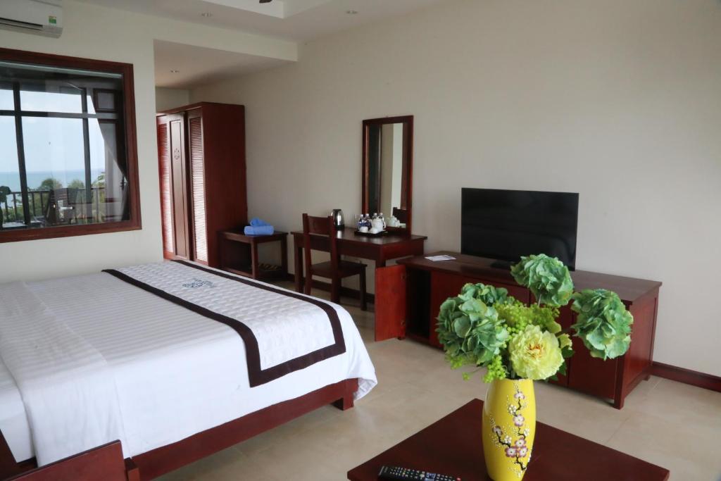 Двухместный (Номер Делюкс с видом на океан) курортного отеля Tropicana Resort Phu Quoc, Дуонг-Донг