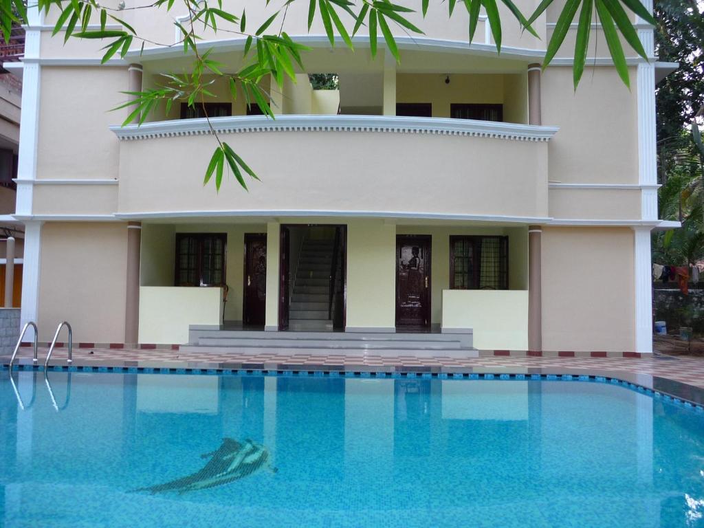 Двухместный (Стандартный двухместный номер с 1 кроватью и вентилятором) отеля Ganesh Holiday Home Bed and Breakfast, Ковалам