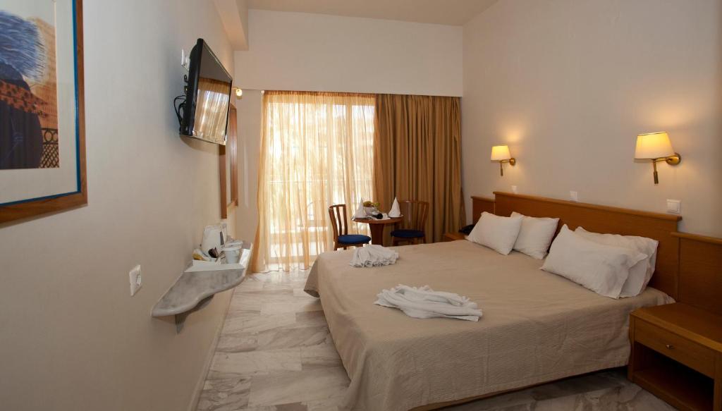 Двухместный (Стандартный двухместный номер с 2 отдельными кроватями) отеля Minos Hotel, Ретимно, Крит
