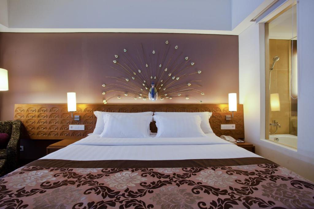 Двухместный (Двухместный номер Делюкс с 1 кроватью или 2 отдельными кроватями, доступ к бассейну) отеля Sun Island Hotel & Spa Kuta, Кута