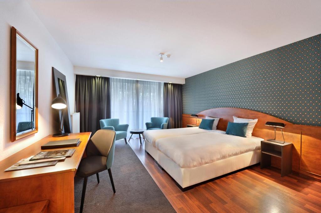 Двухместный (Стандартный двухместный номер с 2 отдельными кроватями и видом на лес) отеля Van der Valk Hotel Nazareth-Gent, Гент