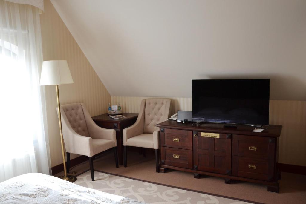 Двухместный (Двухместный номер с 1 кроватью или 2 отдельными кроватями - В мансарде) отеля Hotel Nowodworski, Легница