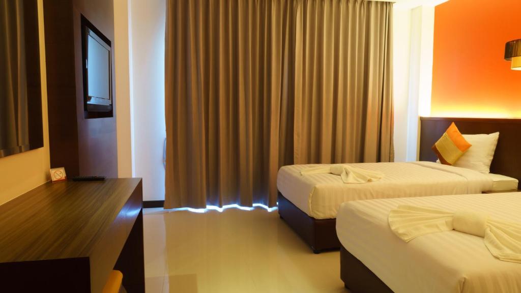 Двухместный (Улучшенный двухместный номер с 2 отдельными кроватями) отеля VISA Hotel Hua Hin, Хуахин